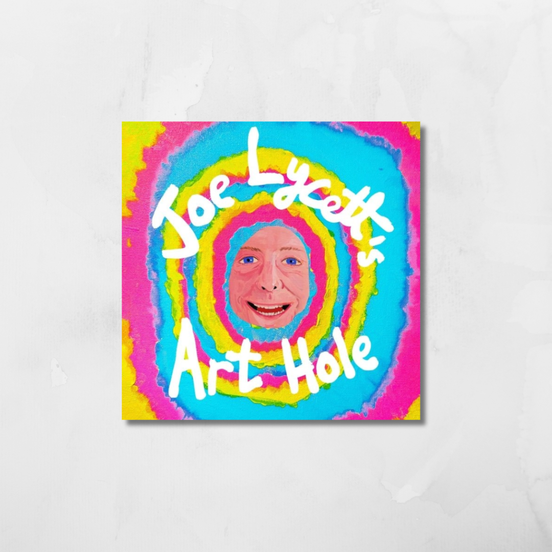 A square art print or poster featuring a colorful psychedelic design with concentric rings of pink, blue, yellow, and green around a central face, with the text 'Joe Lycett's Art Hole' in white script, displayed against a light gray marble-textured background.