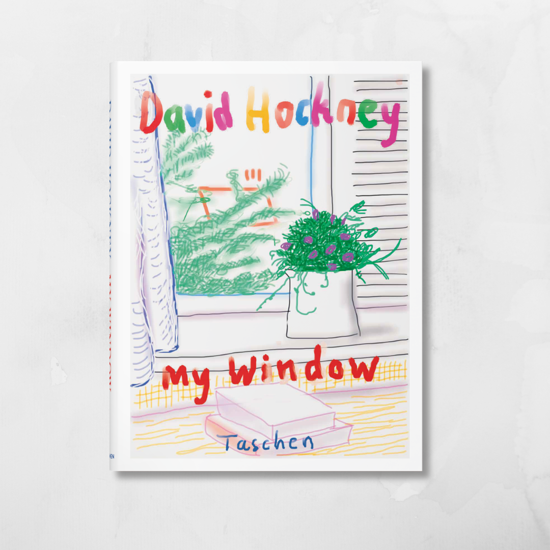 A children's book titled 'David Hockney my Window' by Taschen, featuring a colorful hand-drawn illustration of a window, curtains, and a potted plant on the cover, set against a light gray marble background.