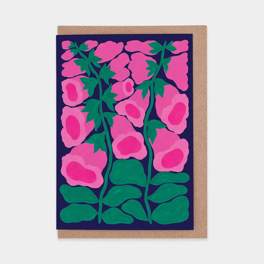 Greeting card with pink flowers and green leaves on a blue background