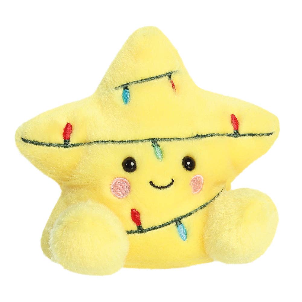 Palm Pals Navi Star Topper plush star toy with a happy face and string lights on a white background