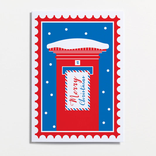 A festive Christmas greeting card by Crispin Finn featuring a red post box with a blue snowy background and a white envelope reading 'Merry Christmas' in red script, set against a light gray background.