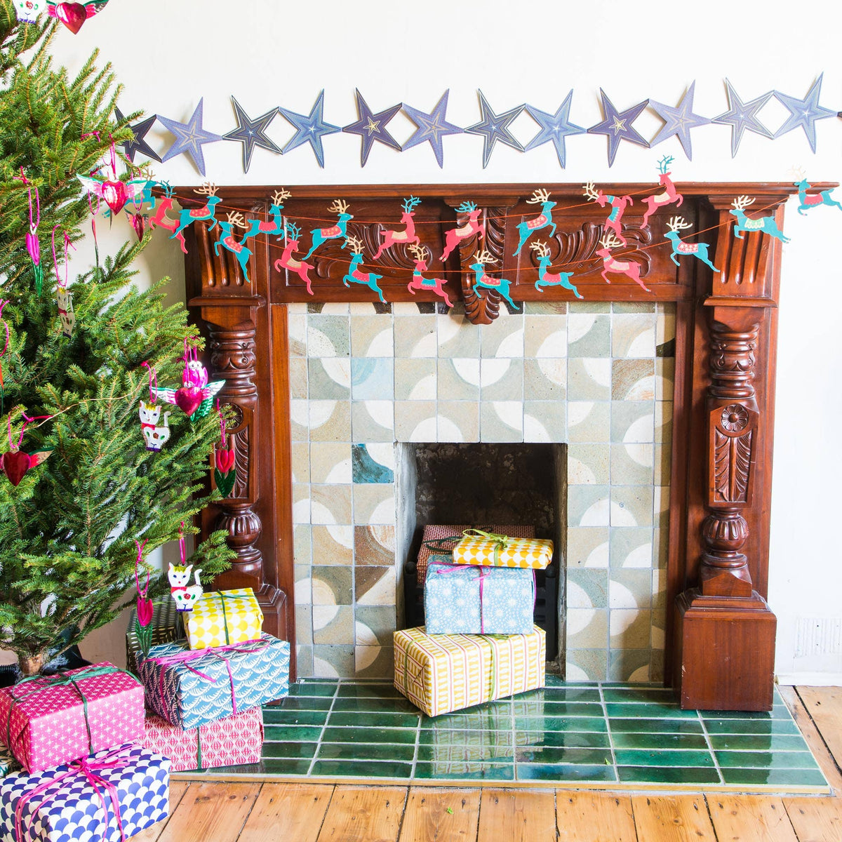 East End Press Garland on fireplace.