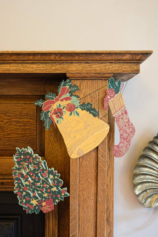 East End Press Christmas Garland on fireplace.