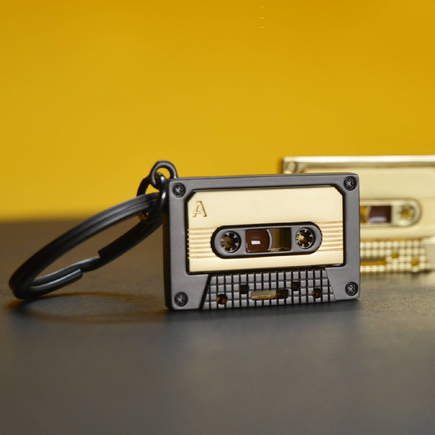 Metalmorphose Matt Grey & Gold Cassette Tape Keyring