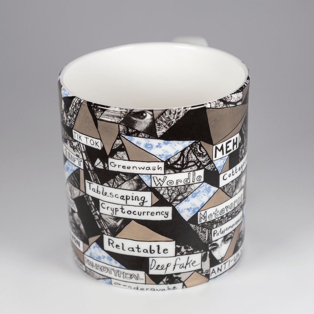 A bone china mug features the artwork from Grayson Perry's Non-Fungible Token (2022), a glazed ceramic pot as seen within Grayson's Art Club: The Exhibition at Midlands Arts